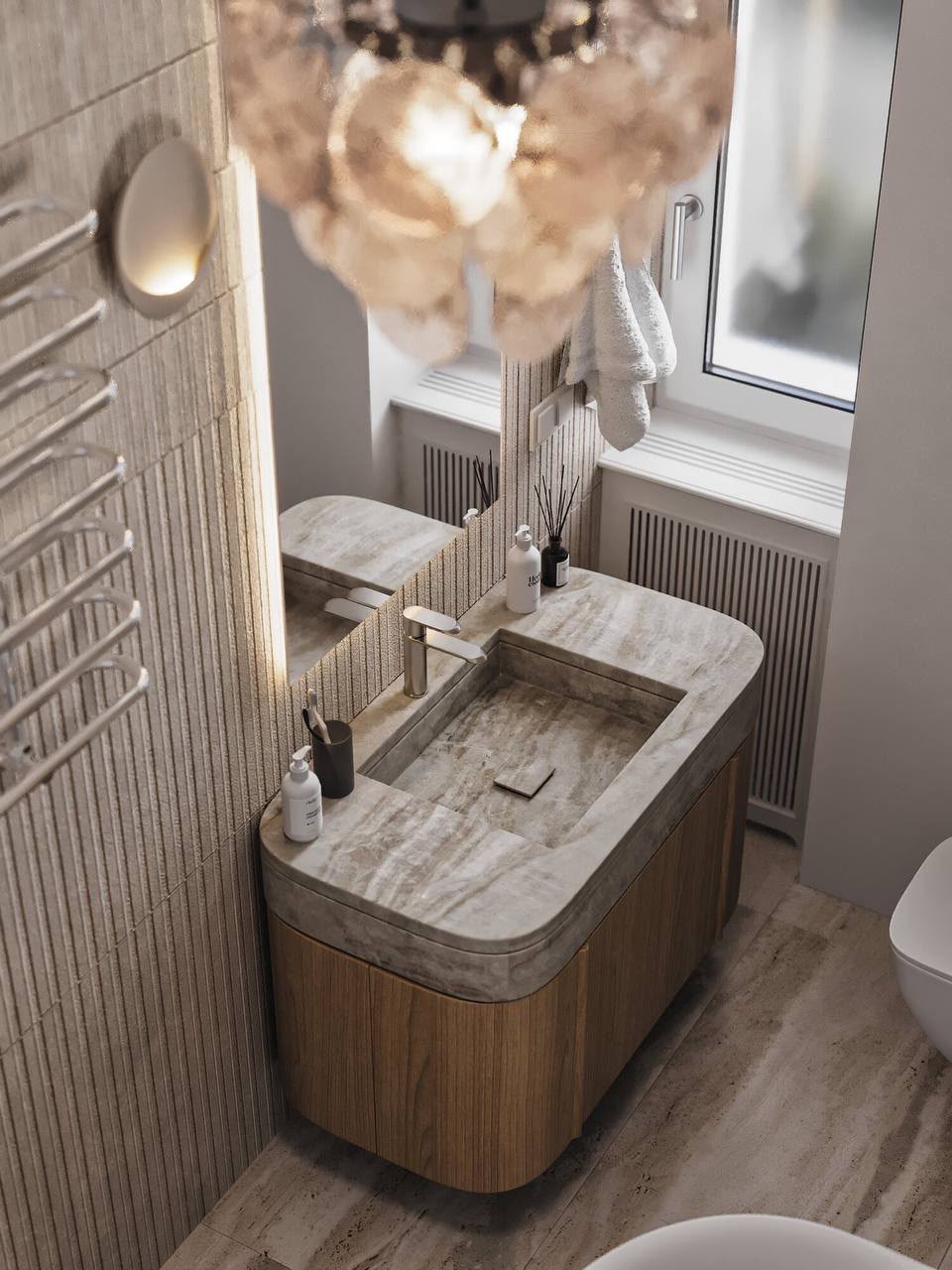 A curved oak vanity with a carved stone basin
