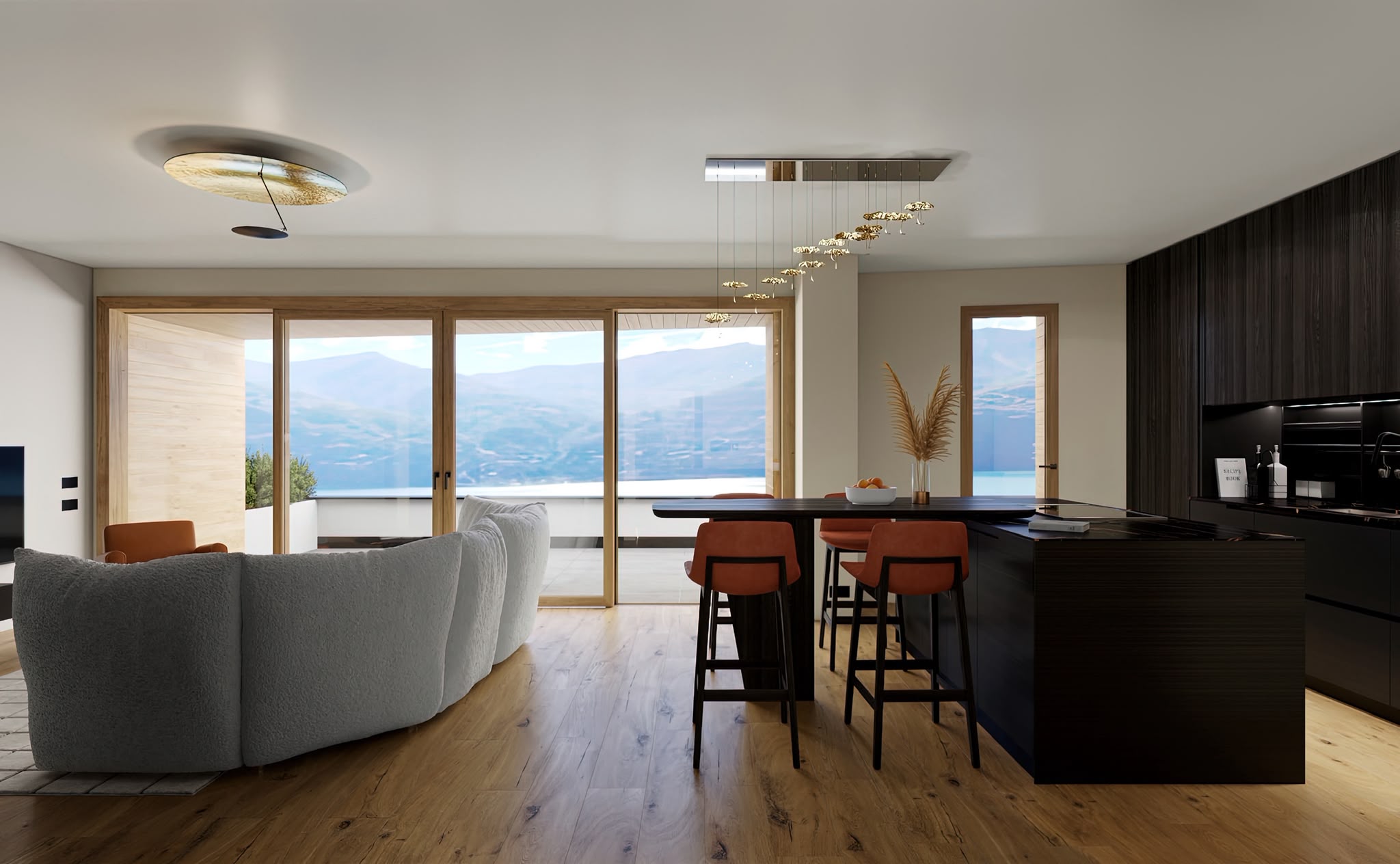 The living room, the dining table and the kitchen share one space and one view