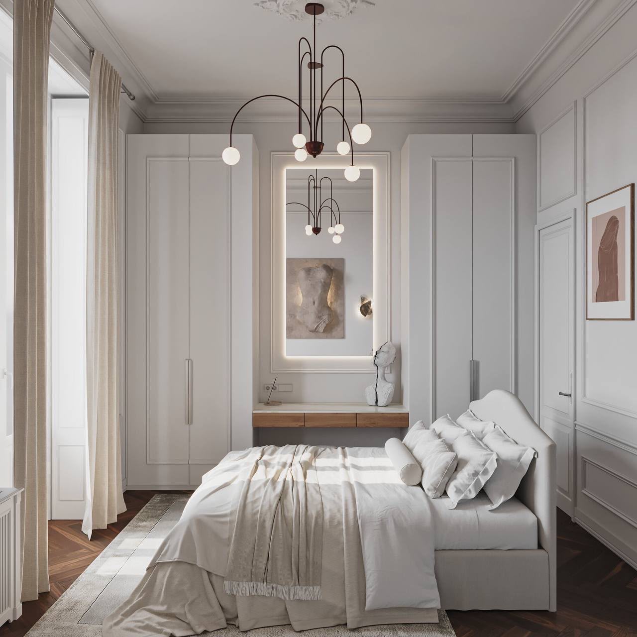 Main bedroom with a backlit mirror and a brass chandelier