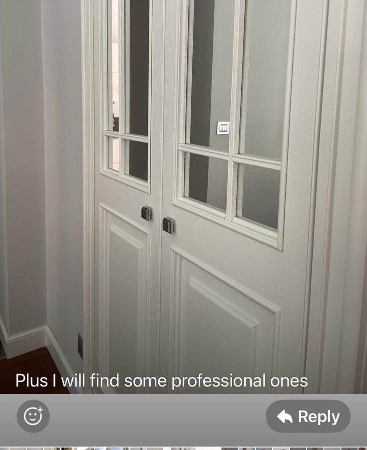 A glazed double door between the rooms