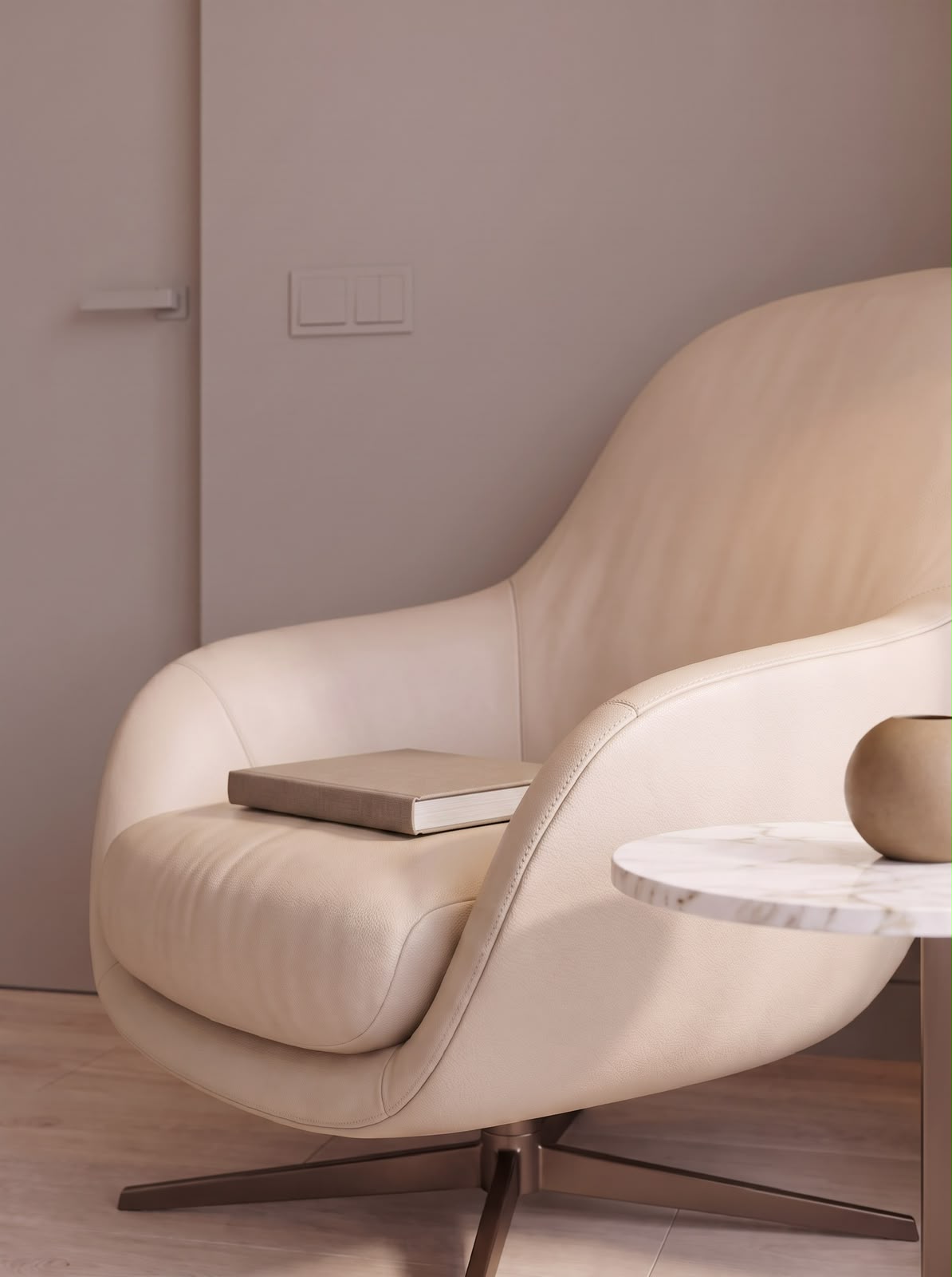 Detail: a leather armchair and a small marble table