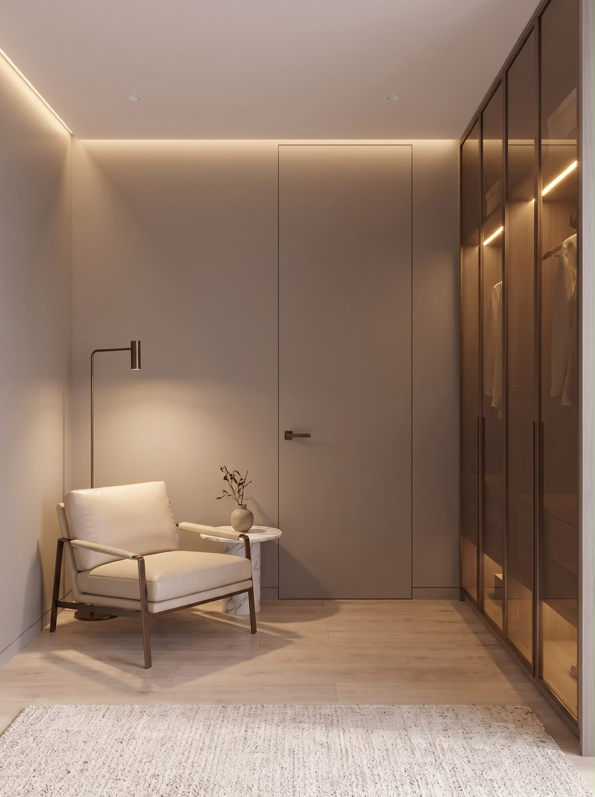 The dressing area: a lounge chair, a floor lamp and wardrobes in smoked glass