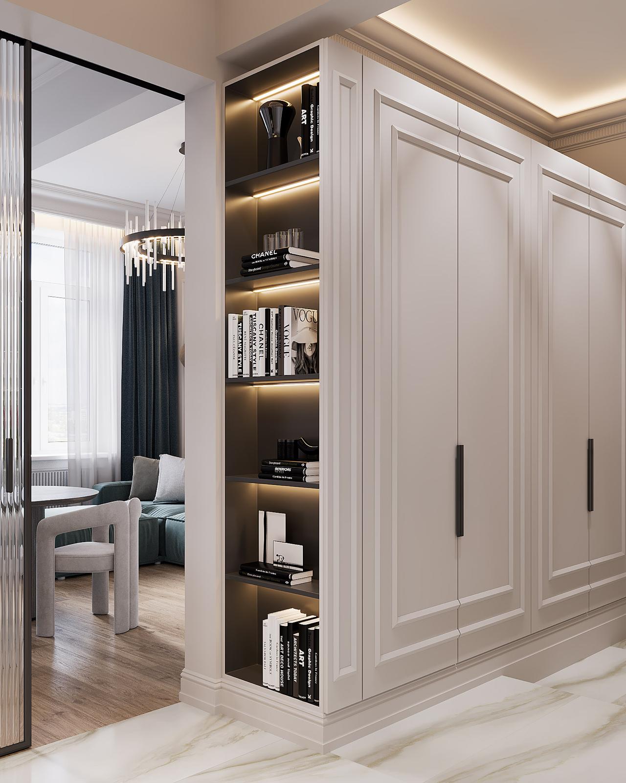 A lit bookcase built into the panelled wall