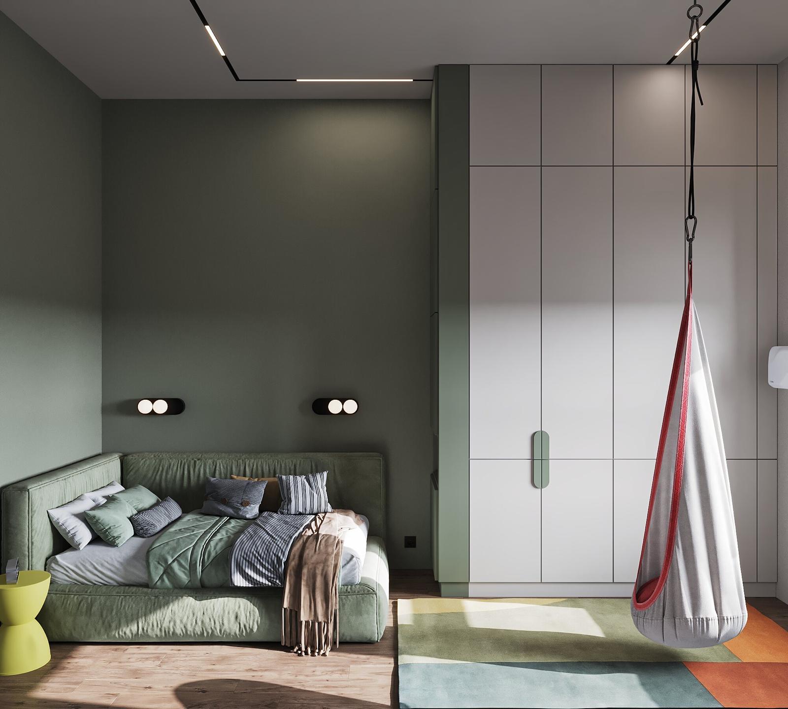 The bed under the wall lights, in green and grey