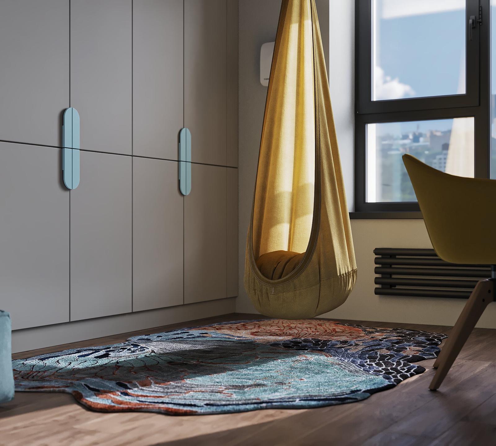 Wardrobe with rounded handles and a hand-tufted rug