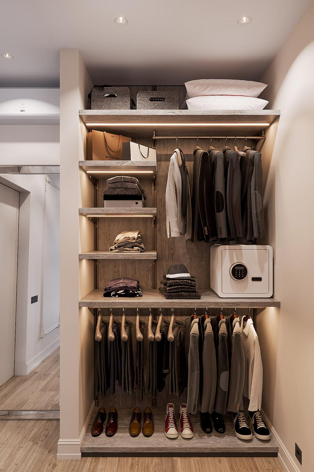 Walk-in closet in oak, with lit shelves