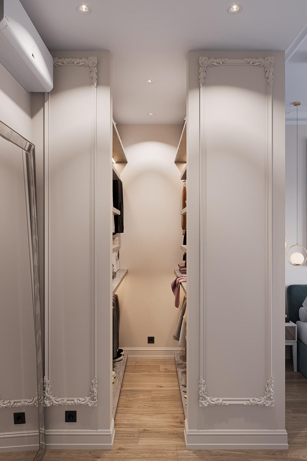 A passage lined with panelled wardrobes